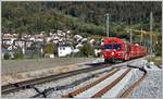 RE1040 aus Davos mit Steuerwagen 1755 bei Malans, wo die Gleislage für die neue Doppelspur angepasst wird.