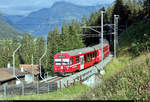 BDt 1754 mit Schublok Ge 4/4 II 619  Samedan , mit Werbung für die Tageszeitung  Südostschweiz , unterwegs bei Cavadürli (Klosters-Serneus) (CH).