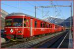 Be 4/4 Pendel mit Steuerwagen 1713 von Thusis nach Chur beim Halt in Ems Werk.