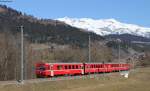 RE 1228 (Scuol-Tarasp-Disentis/Muster) mit Rhb 624 bei Castrisch 9.3.14