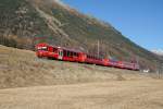 Der Regio 1933  mit dem führenden BDt 1755 fährt am 06.12.2015 von Bever Richtung Samedan.