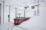 ABe 4/4 51 und 53 mit Bernina-Express bei der EInfahrt in Ospizio-Bernina.