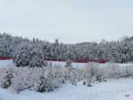 RhB - Triebwagen ABe 4/4 56 mit Zug um 12.07 Uhr unterwegs zwischen Pontresina und St.Moritz am 01.01.2010