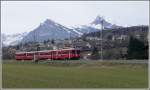 S1 nach Schiers mit Be 4/4 514 bei Malans. Im Hintergrund sind der Gonzen und die Gauschla zu sehen. (18.03.2010)