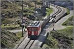 ABe 4/4 II 47 mit leeren Holzwagen auf dem Weg nach Pontresina unweit von Ospizio Bernina.