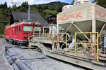 RhB Tunnelarbeitszug mit Gem 4/4 801 im Bahnhof Langwies (Arosalinie) am 21.09.2018.