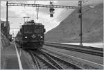 Die RhB Gem 4/4 801 und ein ABe 4/4 II sind mit einem Bernina Regionalzug auf dem Weg nach St.