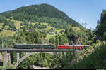 SBB Historic Ae 8/14 11801 anlässlich einer Märklin-Reise am 4. August 2019 auf der Stalvedro-Brücke bei Airolo. (Autobahntunnel im unteren Bildteil per Photoshop entfernt)