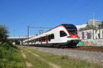 RABe 521 013, auf der S1, fährt zum Bahnhof SBB.