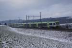 RABe 535 119-2 und RABe 535 113-5 fahren am 22.1.11 von Riedbach Richtung Bern.

