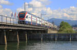 Ein RABe 511 als S5 auf dem Seedamm zwischen Rapperswil und Pfäffikon am 11.08.2016.