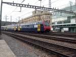 Re 450 Doppelstockpendel der S-Bahn Zrich fhrt in den Bahnhof Oerlikon ein.