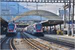 RE4870 nach Wil mit 511 038, RE5068 nach Zürich HB mit ZVV 511 035 in Chur.