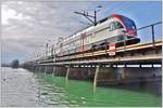 S5 mit 511 018 auf der Seebrücke bei Rapperswil.