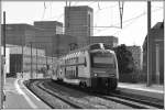 514 055-3 aus Wallisellen fährt in Zürich Oerlikon ein.