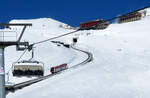 Vom Sessellift aus fotografiert: die Parsennbahn in der Nähe der Bergstation Weissfluhjoch (2662 müM). Davos, 09.02.2018