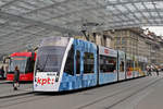 Be 6/8 Combino 670 mit der KPT Werbung, auf der Linie 9, bedient die Haltestelle beim Bahnhof Bern. Die Aufnahme stammt vom 19.12.2018.