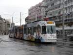 Be 4/8  738 mit Vollwerbung fr eine Kse beim der zufahrt zu der Haltestelle vor dem Bahnhof Bern am 09.12.2007