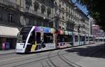 Combino mit der Betriebsnummer 670 hat eine neue Werbung fr das Westside in Bern. Hier steht der Wagen an der Haltestelle Bubenberplatz. Die Aufnahme stammt vom 17.06.2013.