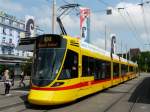 BVB/BLT - Triebwagen Be 6/10 154 unterwegs auf der Linie 10 bei den Haltestellen vor dem SBB Bahnhof in Basel am 28.06.2009