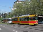 Be 4/8 240 mit der Vollwernung fr Berufe im Gesundheitswesen und der Be 4/6 213 fahren vom Basler Hauptbahnhof Richtung Aeschenplatz. Die Aufnahme stammt vom 21.04.2011.