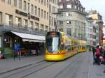 BLT - Tram Be 6/10  153 unterwegs auf der Linie 11 in der City von Basel am 01.12.2012