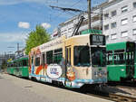 Dreiwagenzug, mit dem Be 4/4 502 mit der Werbung für Le Gruyère, dem B4S 1505 und dem B4 1455, auf der Linie 14, wartet am 10.05.2012 an der Endstation in Pratteln.