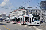 Be 6/8 Combino 318 mit der Werbung f�r Swissmilk, auf der Linie 8, f�hrt am 12.06.2013 zur Haltestelle Markthalle. Aufnahme Basel.
