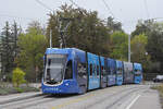 Be 6/8 Flexity 5006 mit der SANDOZ Werbung, auf der Linie 6, f�hrt am 19.10.2026 bei der Haltestelle Weilstrasse ein. Aufnahme Riehen.