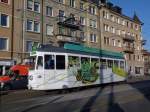 Wrend der MUBA ist der Oldtimer Motorwagen 413 als Tram Lounge unterwegs.