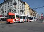 Motorwagen 671 mit der Vollwerbung fr die Firma Real Estate AG fhrt in Basel auf die Haltestelle Claraplatz ein. Die Aufnahme stammt vom 10.04.2011. 