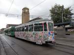 Der von Kindern bemalte Anhnger ist wieder im Linienbetrieb. Hier auf der Linie 2 an einem regnerischen Sonntag am Badischen Bahnhof in Basel. Die Aufnahme stammt vom 18.09.2011. 