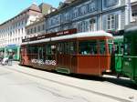 BVB - Trambeiwagen mit Werbung B 1469 unterwegs in Basel am 04.05.2012