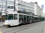 BVB - Tram Be 4/8 666 mit Werbung und mit Tramanhänger unterwegs in Basel am 02.05.2013