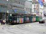 BVB - Tram Be 4/8 667 mit Werbung und mit Tramanhänger unterwegs in Basel am 02.05.2013