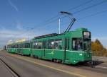 Dreiwagenzug mit dem Be 4/4 500 , dem B 1484 S und dem B 1483 auf der Linie 1 auf der Dreirosenbrcke.