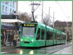 Es war regnerisch am 05.12.2006 in Basel. Es reichte genau fr ein Bild vor dem Hauptbahnhof mit dem Combino Tram Be 6/8 326 der BVB, bevor ich Richtung Sden die Sonne wieder fand.