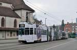 Vollwerbezug mit dem Be 4/6 S 675 und dem B 1459, mit einer Emporio Armani Uhren Werbung, anlässlich der Basel World, fährt vom Wettsteinplatz zur Haltestelle am Kunstmuseum. Die Aufnahme stammt vom 01.03.2016.