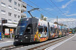 Be 6/8 Flexity 5015 mit der Hieber Werbung, auf der Linie 14, wartet an der Endstation in Pratteln.