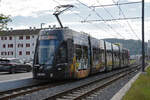 Be 6/8 Flexity 5015 mit der Hieber Werbung, auf der Linie 14, fährt am 19.08.2023 bei der Haltestelle Gempenstrasse ein.