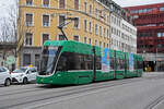 Be 4/6 Flexity 6015, auf der wegen der gesperrten Margarethenbrücke umgeleiteten Linie 16, fährt am 12.02.2024 zur Haltestelle beim Bahnhof SBB.