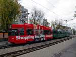 Motorwagen 495 mit der Vollwerbung fr Schopping im St Jakobpark auf der Linie 14 an der Endstation in Pratteln.