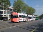 Motorwagen 671 mit der Vollwerbung fr die Firma Real Estate AG fhrt in Basel durch den Steinenring Richtung Haltestelle Schtzenhaus.