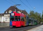 FC Basel Tramzug mit dem Be 4/4 490 an der Spitze fhrt zur Haltestelle Markthalle.