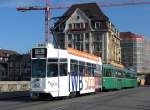 Dreiwagenzug mit dem Be 4/4 479 mit der IWB Vollwerbung an der Spitze auf der Linie 14 auf der Mittleren Rheinbrcke.