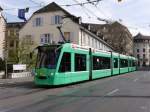 BVB Basel - Tram Be 6/8 323 unterwegs auf der Linie 8 in der Stadt Basel am 29.03.2014