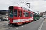 Be 4/4 501 zusammen mit dem B 1476 S und dem Be 4/4 482 mit der Chemnis de fer du Jura Werbung auf der Linie 3 kurz vor der Haltestelle Salinenstrasse.