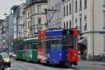 Be 4/4 490 FC Basel zusammen mit dem B 1456 S und dem Be 4/4 488 auf der Linie 3 fahren Richtung Haltestelle Waldenburgerstrasse.