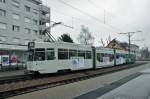 Be 4/6 S 683 mit der Pro Innerstadt Werbung zusammen mit dem B 1437 auf der Linie 14 warten an einem trüben Tag an der Endhaltestelle in Pratteln.