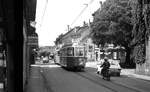 Genf Tram__Zug der Linie 12 bei der Haltestelle 'Chêne-Bourg Poste' mit Bw 304 [Schweizer Standardwagen 50er Jahre].__31-08-1976